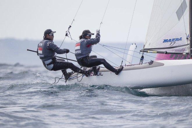 Justin Liu and Denise Lim, SIN, Mixed Multihull (Nacra 17) at day two - 2015 ISAF Sailing WC Weymouth and Portland © onEdition http://www.onEdition.com